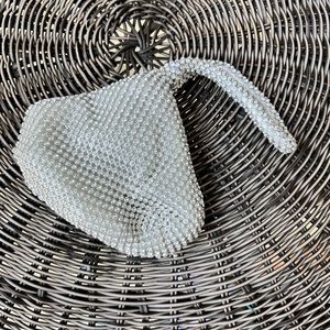 Silver rinestone studded clutch purse. Good for carrying small items